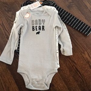 Three long sleeve body’s suits